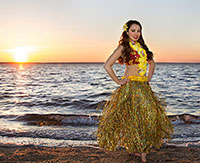 hula dancer in gold skirt